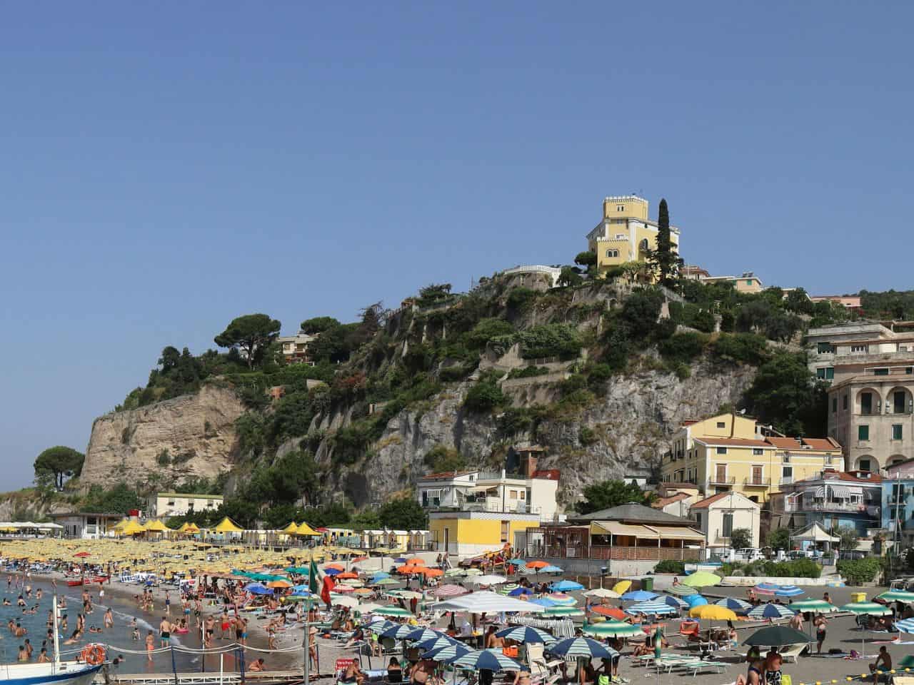 People relaxing on the famous beach Spiaggia di Marina di Vietri located on the Amalfi Coast harbor