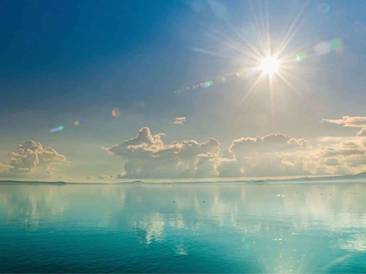 Bright day view of Lake Bolsena Italy