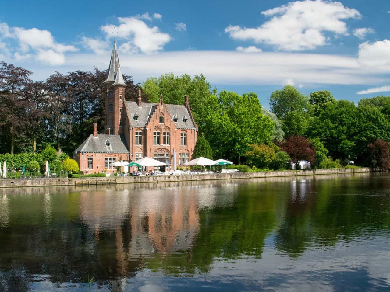 Stunning view of Minnewater Park aka Lake of Love in Bruges Belgium