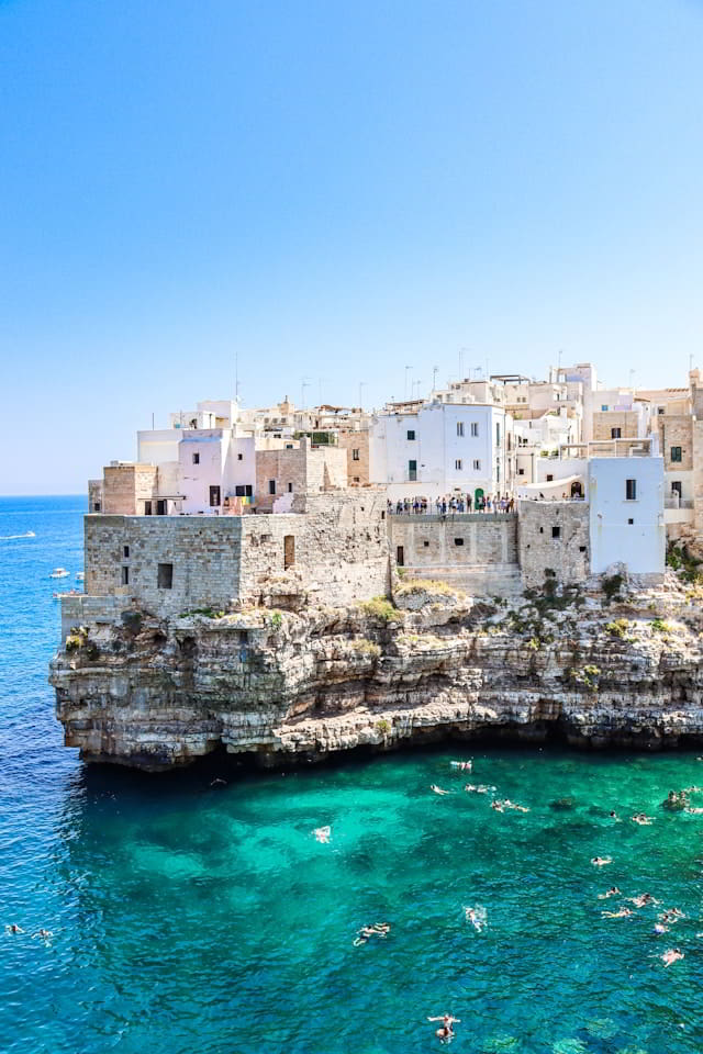 People soaking in water in Puglia Italy