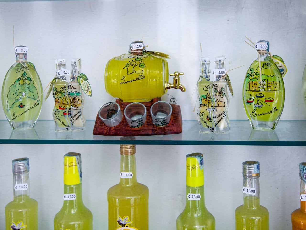 Various Glass bottles of Limoncello in the Amalfi Coast Italy