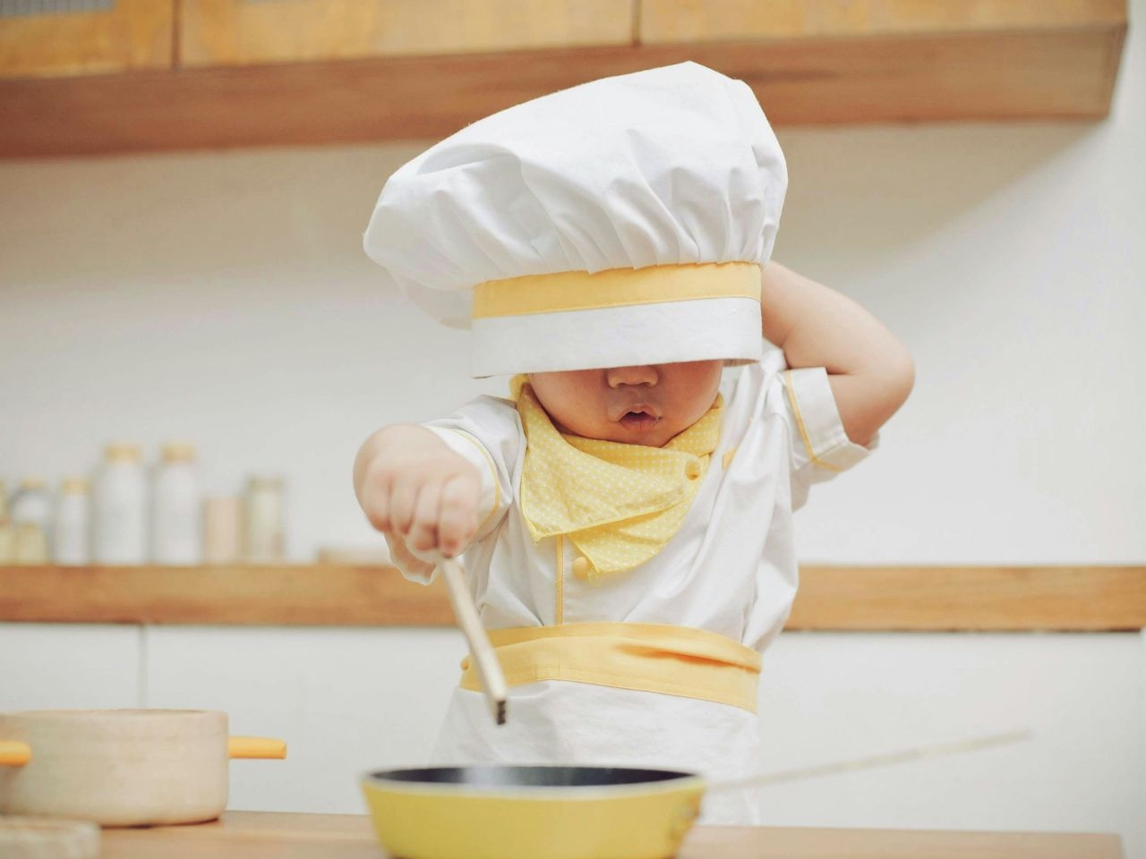 Small boy in a chef's dress