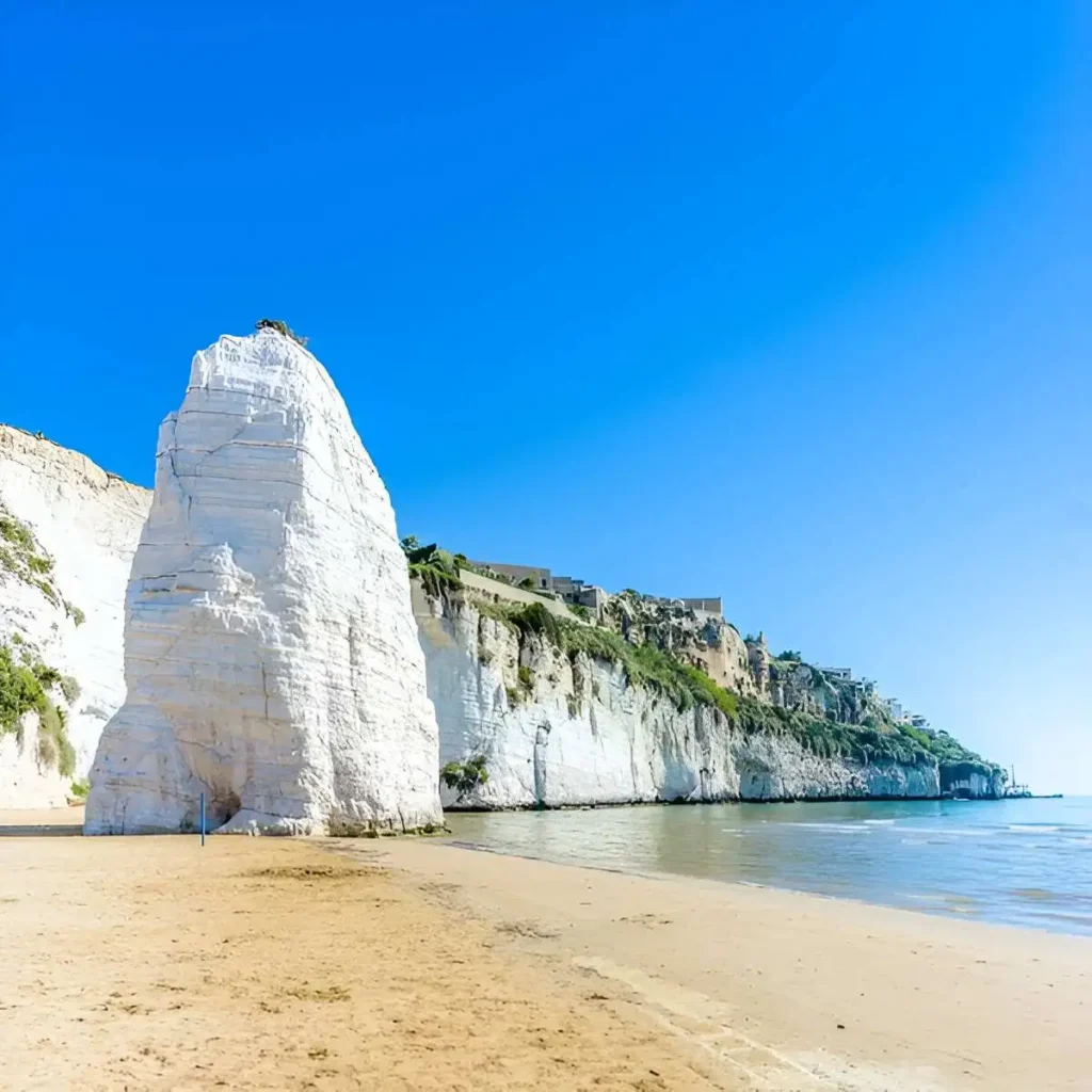 Beach of Pizzomunno rock, at Vieste, Apulia region, south Italy