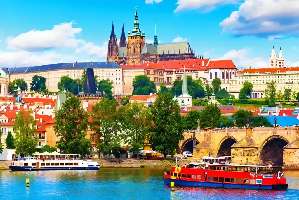 Scenic summer panorama of the Old Town architecture with Vltava river, Charles Bridge and St.Vitus Cathedral in Prague, Czech Republic which is one of the most romantic places in the world