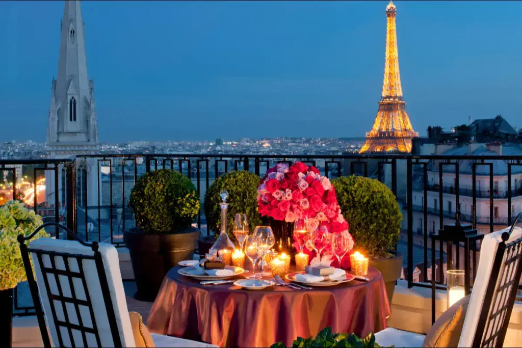 Romantic candle -lit dinner table in front of the iconic Eiffel Tower; one of the most romantic places in the world for couples to propose