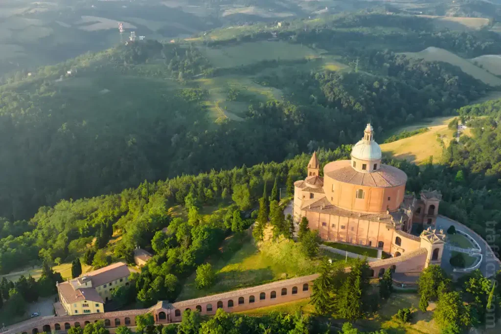 Aerial view of San Luca Sanctuary in Bologna; best cities to visit in Italy