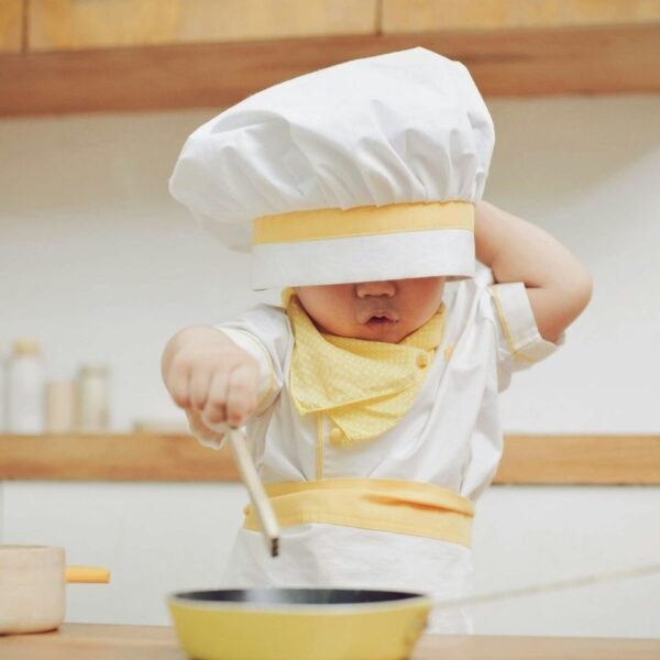 Small boy in a chef's dress