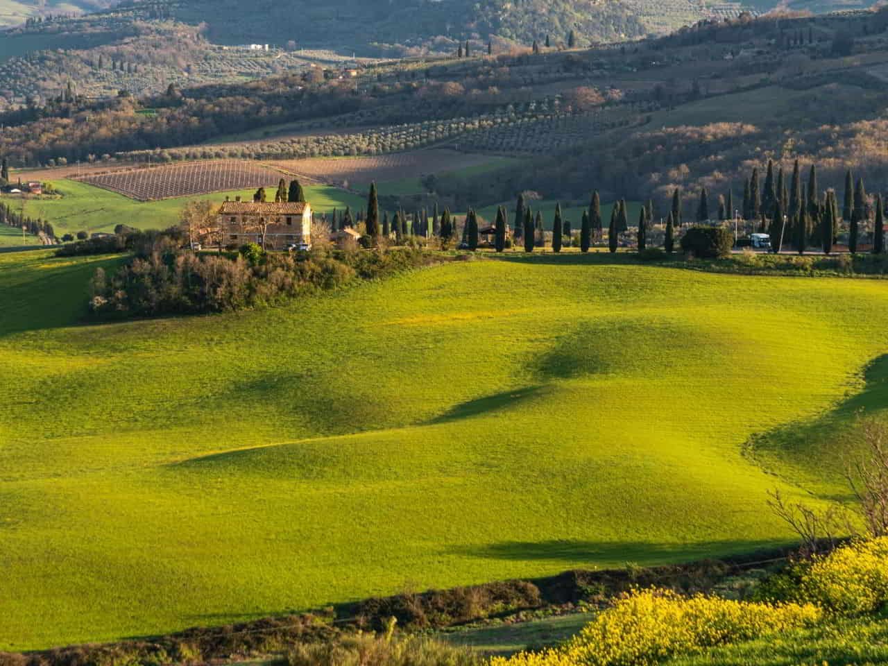 scenic rolling green hills of the val dorcia region in tuscany italy