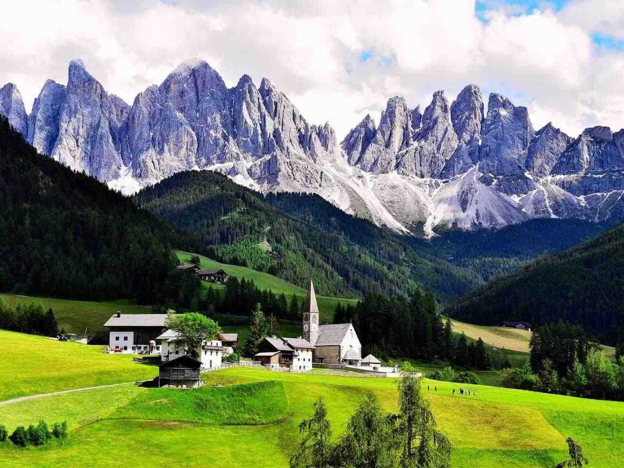Scenic view of San Giovanni Church Dolomites one of the best places to visit in Italy