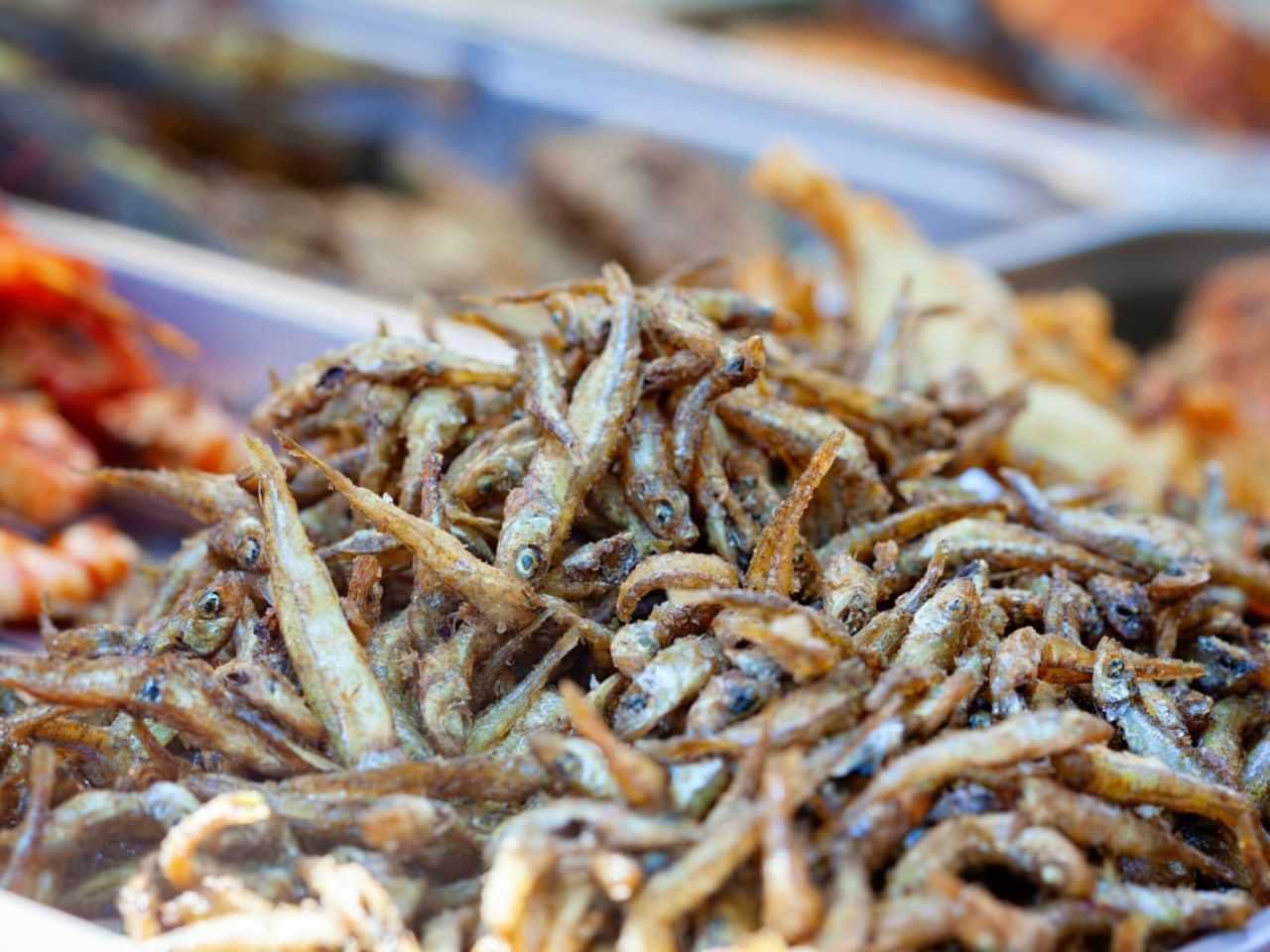 Close-up of crispy seasoned fried anchovies