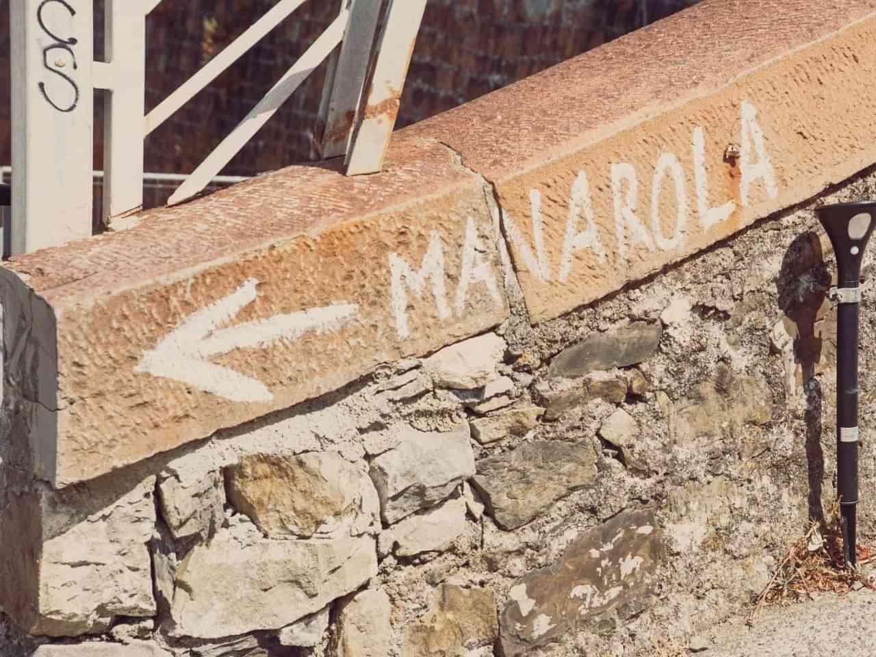 Directional sign pointing toward Manarola in the Cinque Terre National Park Italy